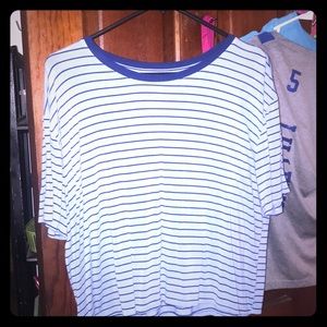 A light blue striped shirt size larger
